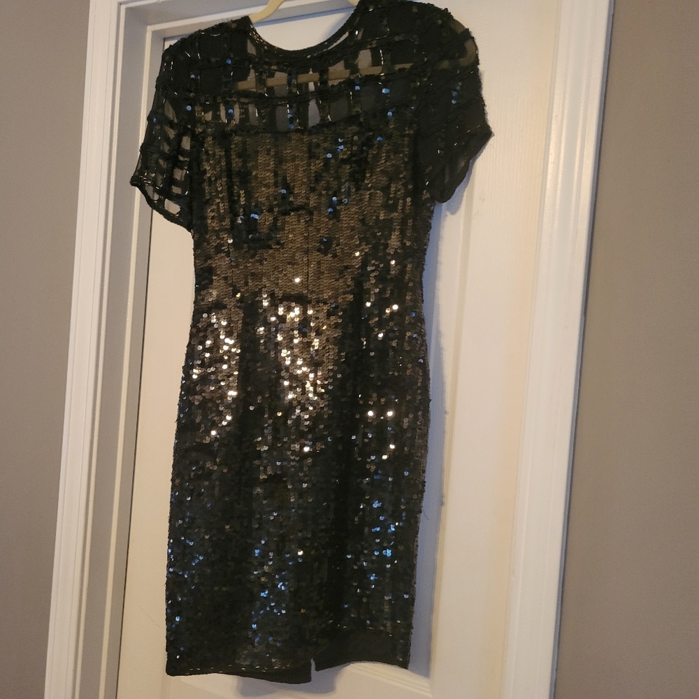 Elegant black sequin dress with sheer. Excellent condition